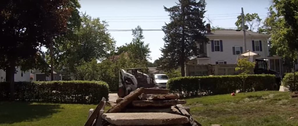 demolishing a concrete driveway